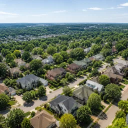 Residential neighborhoods with varied rooflines and tree-lined streets